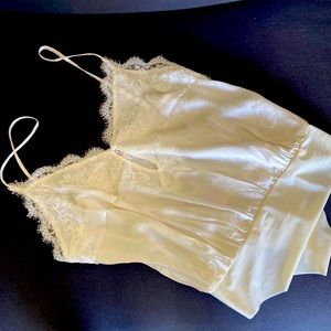 A beautiful Cami NYC silk bodysuit with lace detail, never worn!